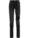 Amiri Ripped Skinny Jeans In Black