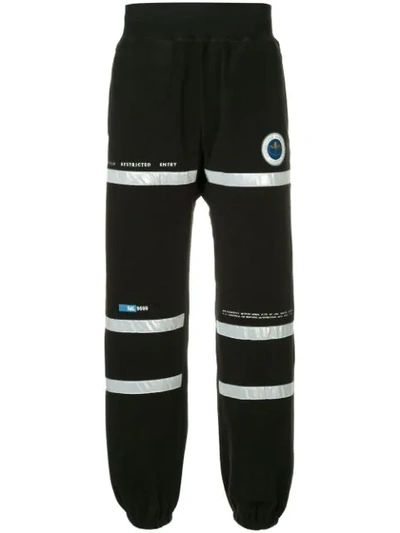 Undercover Astronautics Agency Patch Track-pants In Black