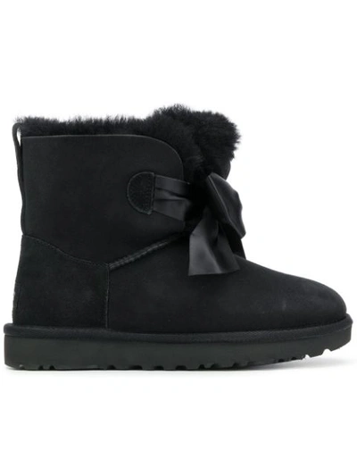 Ugg Gita Bow Mini Boots In Black | ModeSens
