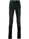 Amiri Stack Skinny Jeans In Black