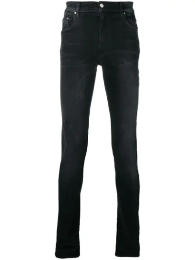 Amiri Stack Skinny Jeans In Black