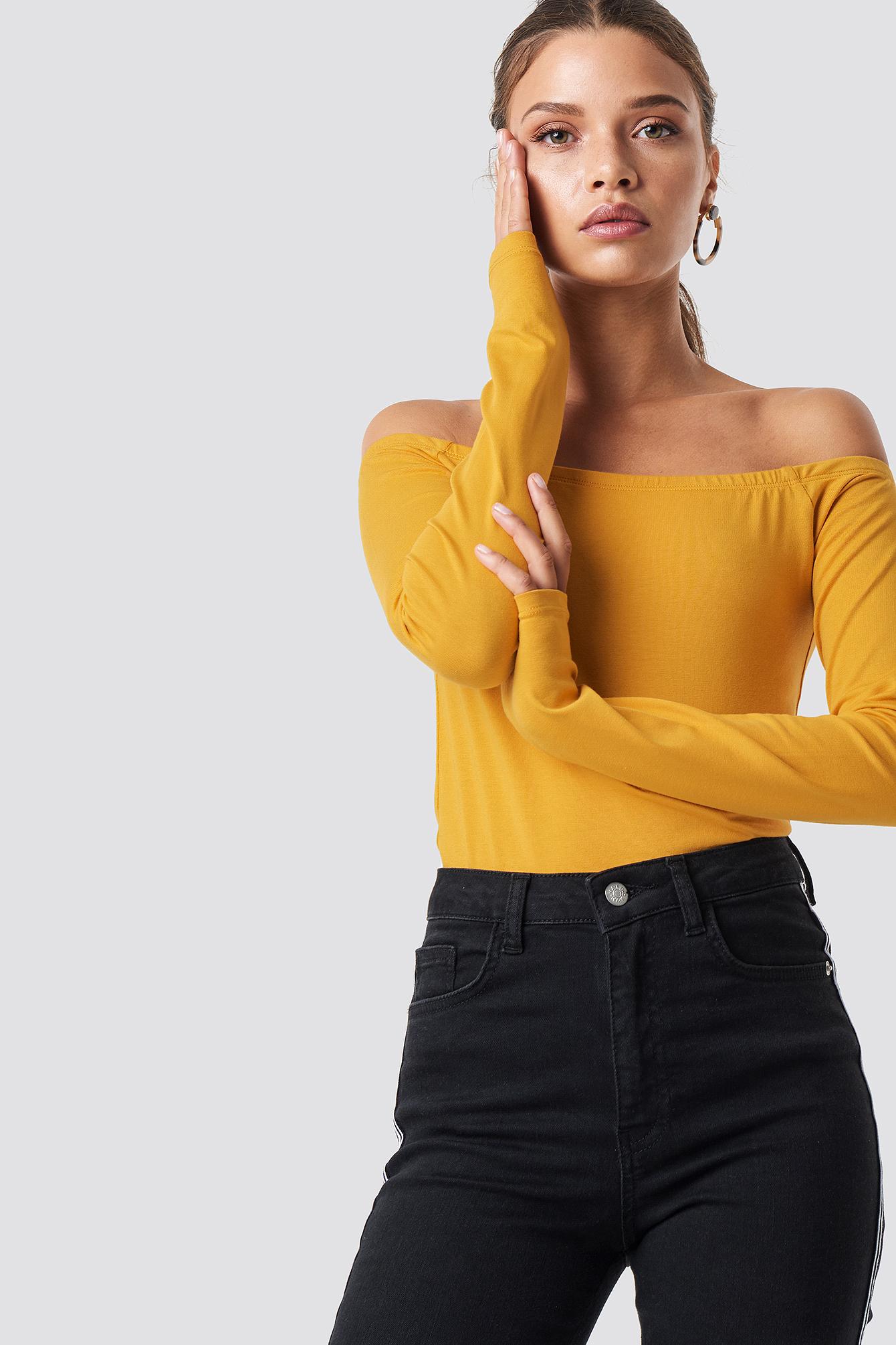 yellow top off shoulder