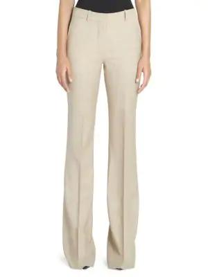 flared beige trousers
