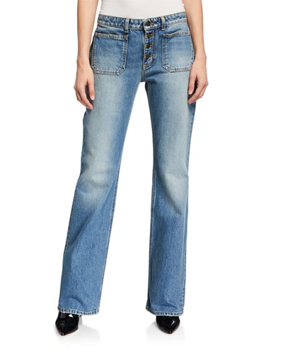 Saint Laurent Exposed-button Faded Flare Jeans In Blue