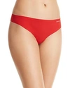Calvin Klein Invisibles Thong In Manic Red