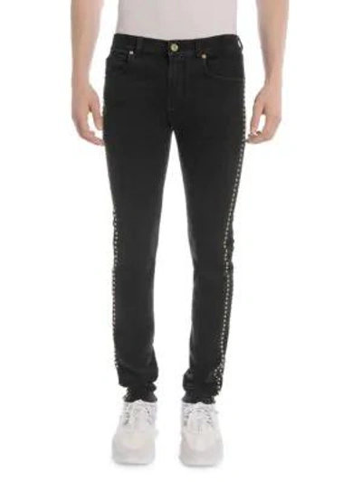 Versace Studded-side Skinny Jeans In Black