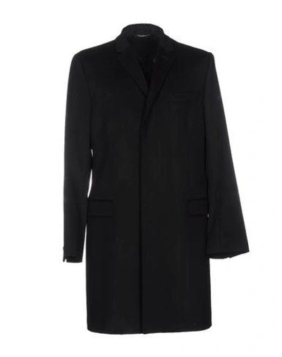 Dolce & Gabbana Coats In Black