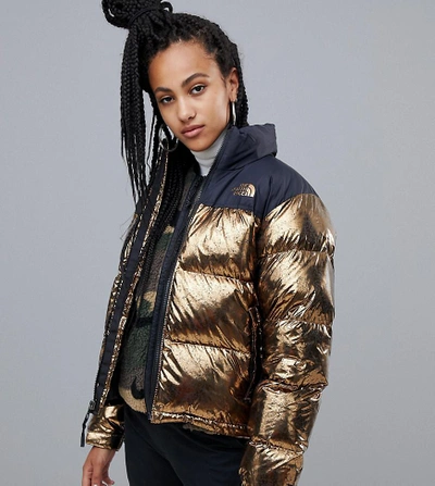 The North Face Womens 1996 Retro Nuptse Jacket In Copper Gold - Main Image