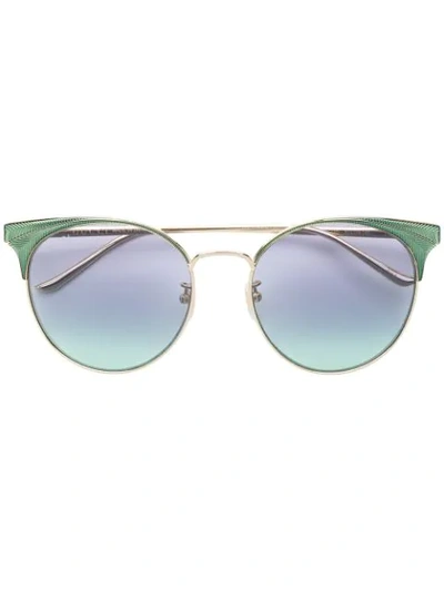 Gucci Oversized Cat Eye Sunglasses In Gold
