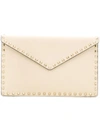 Valentino Garavani Rockstud Clutch In Neutrals