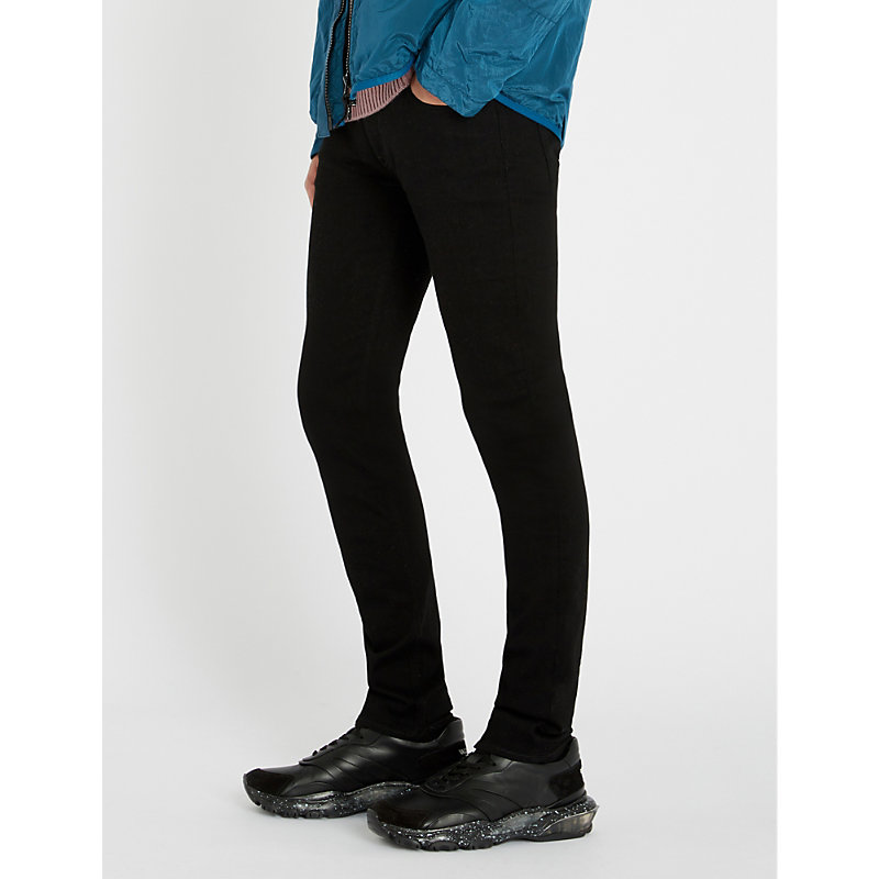 black skinny stone island jeans
