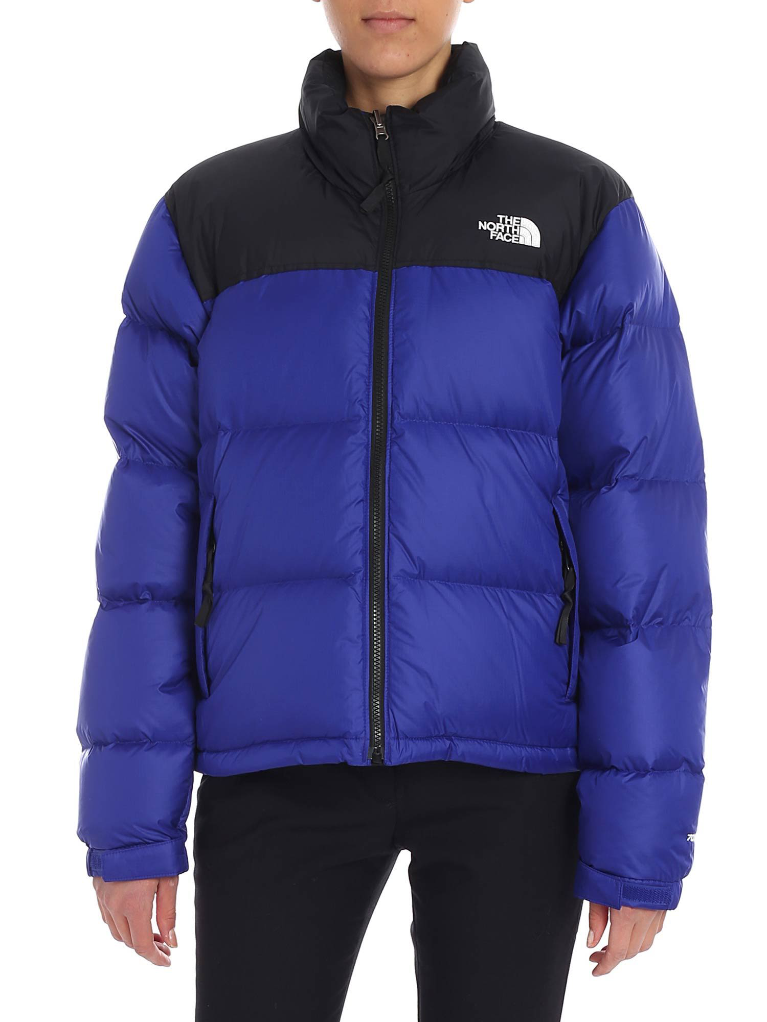 blue and black north face puffer