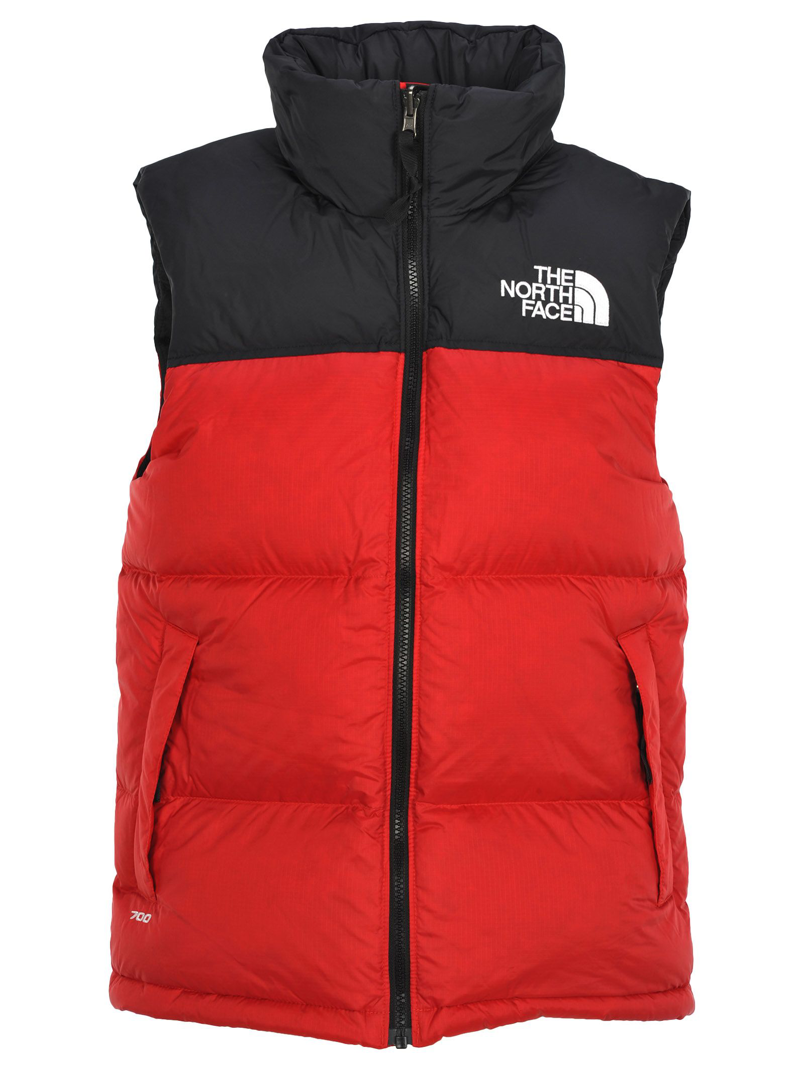 red and black north face body warmer