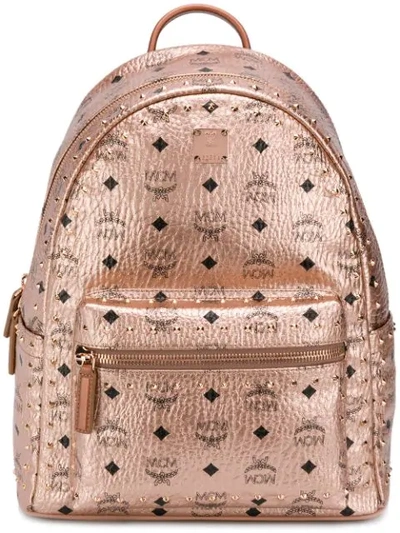 Mcm Metallic Studded Backpack In Pink