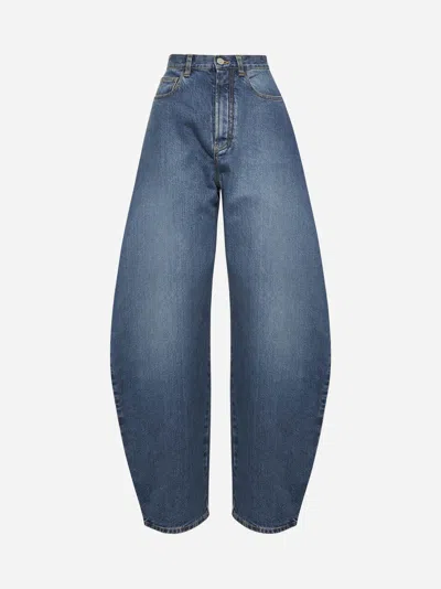 Alaïa Women's Barrel-leg Faded Denim Jeans In Blue