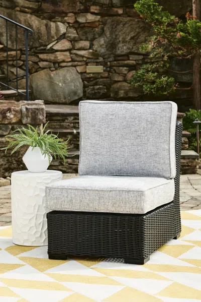 Ashley Beachcroft Outdoor Armless Chair With Cushion In Black/light Gray