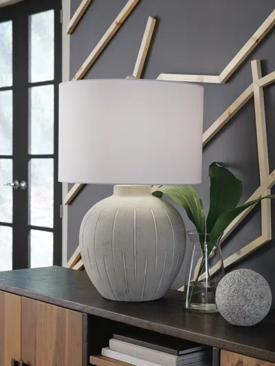 Ashley Calbert Table Lamp In Warm Gray