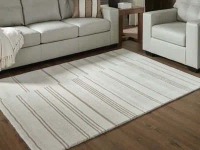 Ashley Gadence 5' X 7' Area Rug In Ivory/tan
