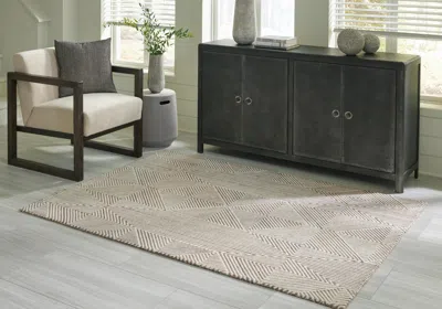 Ashley Jadott 5' X 7' Rug In Beige/brown