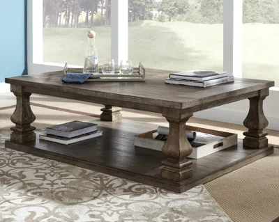Ashley Johnelle Coffee Table In Gray