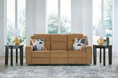 Ashley Kanlow Manual Reclining Sofa In Honey