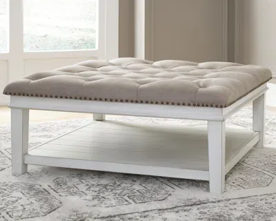 Ashley Kanwyn Upholstered Ottoman Coffee Table In Grayish Brown/white