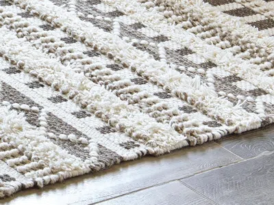 Ashley Karalee 8' X 10' Rug In Ivory/brown