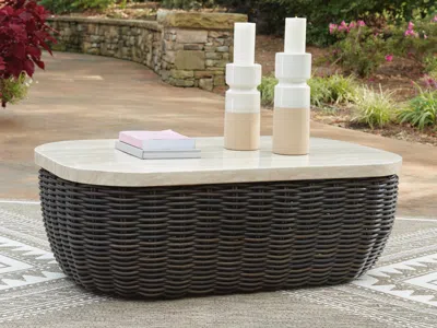 Ashley Kimora Outdoor Coffee Table In Beige/dark Brown