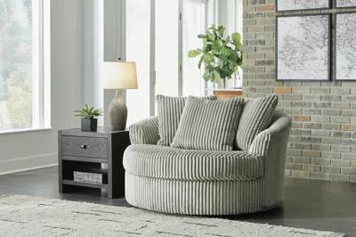 Ashley Lindyn Oversized Swivel Accent Chair In Fog