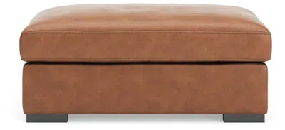 Ashley Luxe Calden Leather Ottoman Leather In Caramel