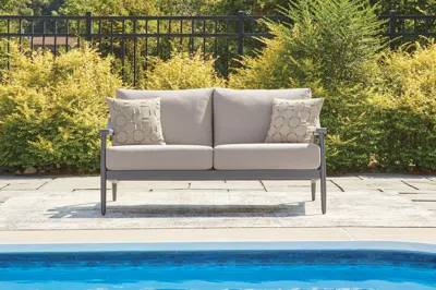 Ashley North Island Outdoor Loveseat With Cushion In Gray
