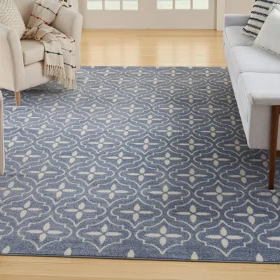 Ashley Nourison Home Outdoor Essentials 6' X 9' Area Rug In Blue/ivory