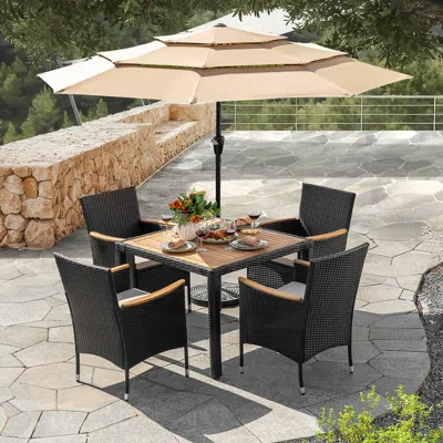 Ashley Nuu Garden Outdoor Patio Dining Table And 4 Chairs In Black/beige