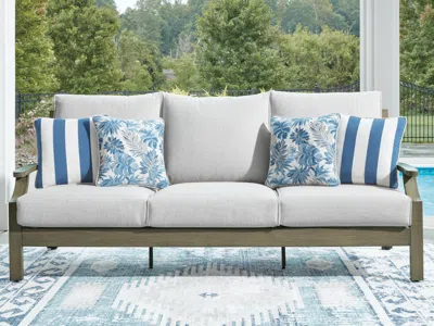 Ashley Rainier Ranch Outdoor Sofa With Cushion In Brown/beige