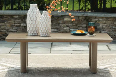 Ashley Serene Bay Outdoor Coffee Table In Dark Brown