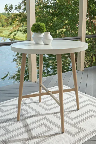 Ashley Seton Creek Outdoor Bar Table In Beige
