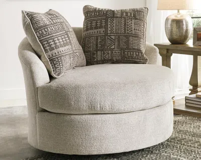 Ashley Soletren Swivel Accent Chair In Stone