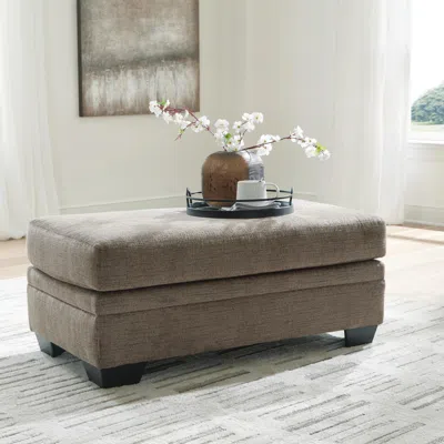 Ashley Stonemeade Ottoman In Nutmeg