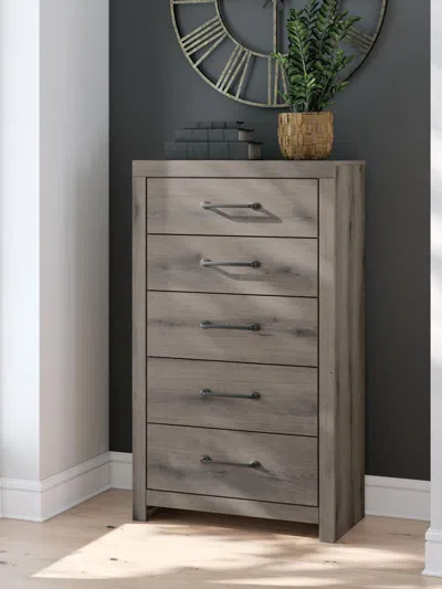 Ashley Urbanoore 5 Drawer Chest Of Drawers In Brown Gray