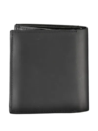 Calvin Klein Embossed-logo Bifold Wallet In Black