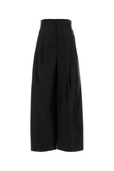 Carven Tr433-double Pleat Trousers In Black