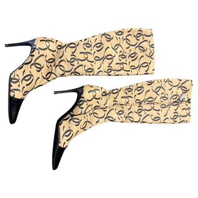 Pre-owned Chanel Beige Cc Monogram Print Leather Boots With Black Pointed Toe And Stiletto