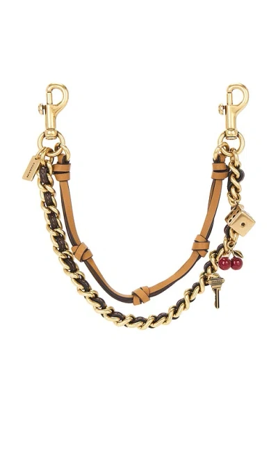 Coach Leather And Metal Swag Bag Charm In Maple Honey