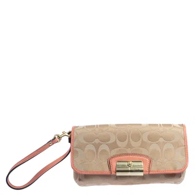 Coach /orange Signature Canvas And Leather Wristlet Clutch In Gold