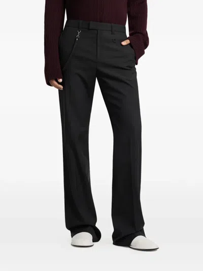 Courrèges Logo-patch Trousers In Black