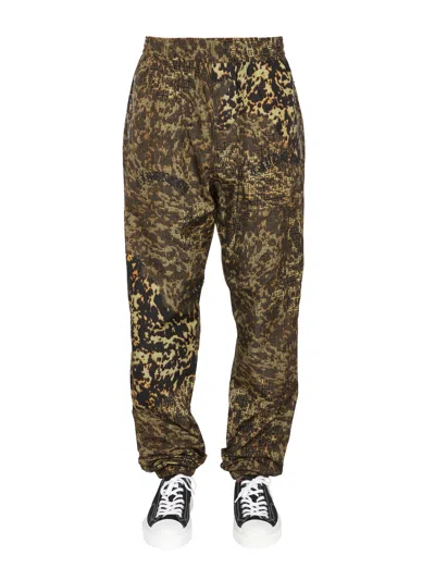 Givenchy 4g Print Trousers In Brown