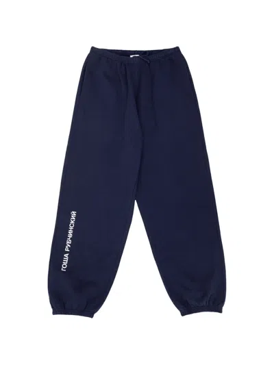 Gosha Rubchinskiy Logo-print Cuffed Track Pants In Blue
