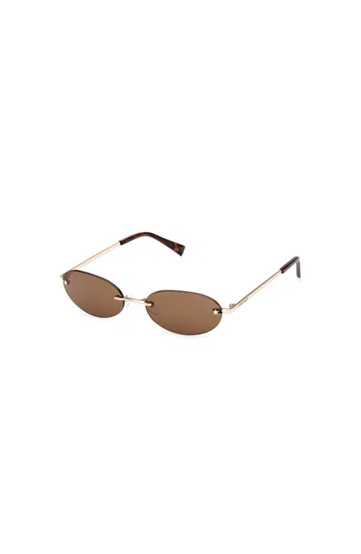 Guess Small Oval Metal Sunglasses In Gold