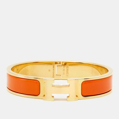 Pre-owned Hermes Clic H Orange Enamel Gold Plated Bracelet