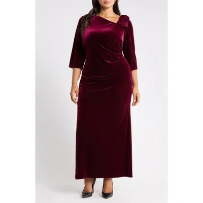 Jessica Howard Asymmetrical Neck Bow Velvet Gown In Burgundy